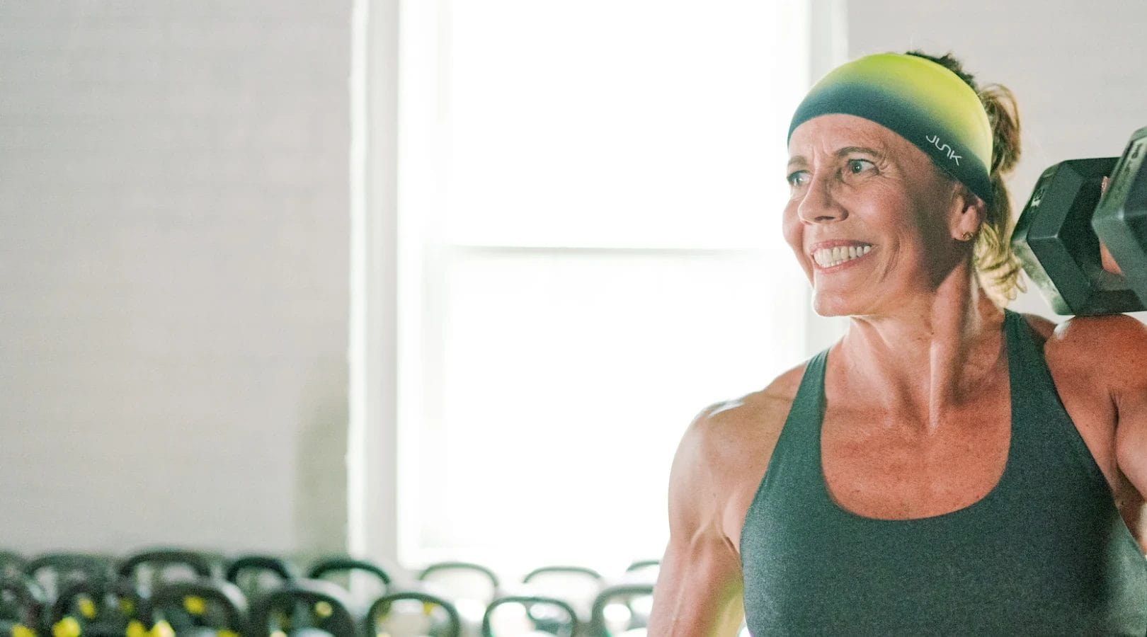 Older woman lifting weights